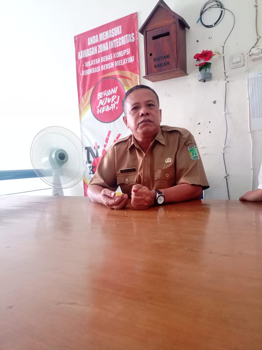 ANDARU HUSNI Kabid Bina Pemerintahan Desa DPMD Kabupaten Pasuruan Lempar Tanggung Jawab