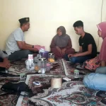 kh sukiyanto baju putih berpeci saat mendatangi rumah widi di gununggangsir beji sabtu 88 zhguf